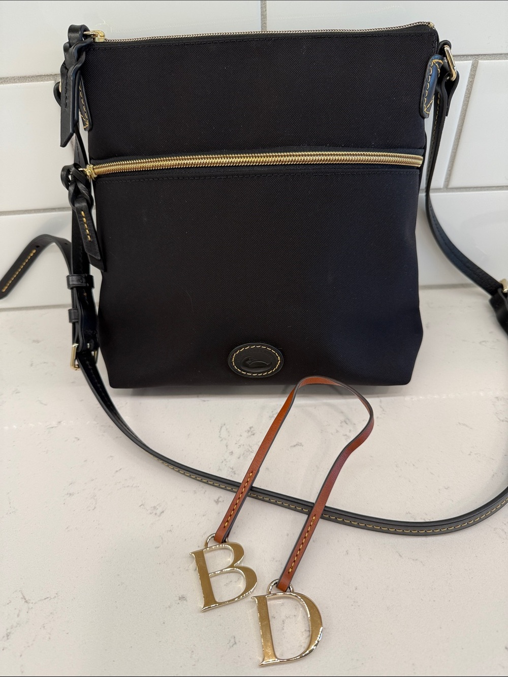 Dooney & Bourke Black Nylon Crossbody Bag with Front Zip Pocket